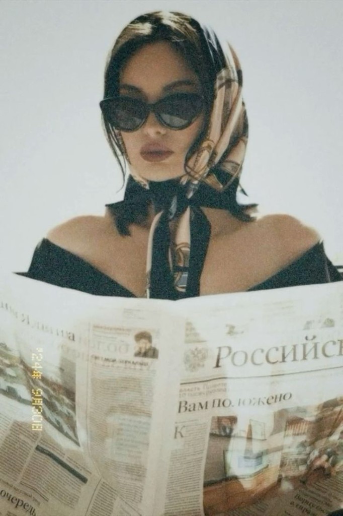 A woman reading the morning gazette